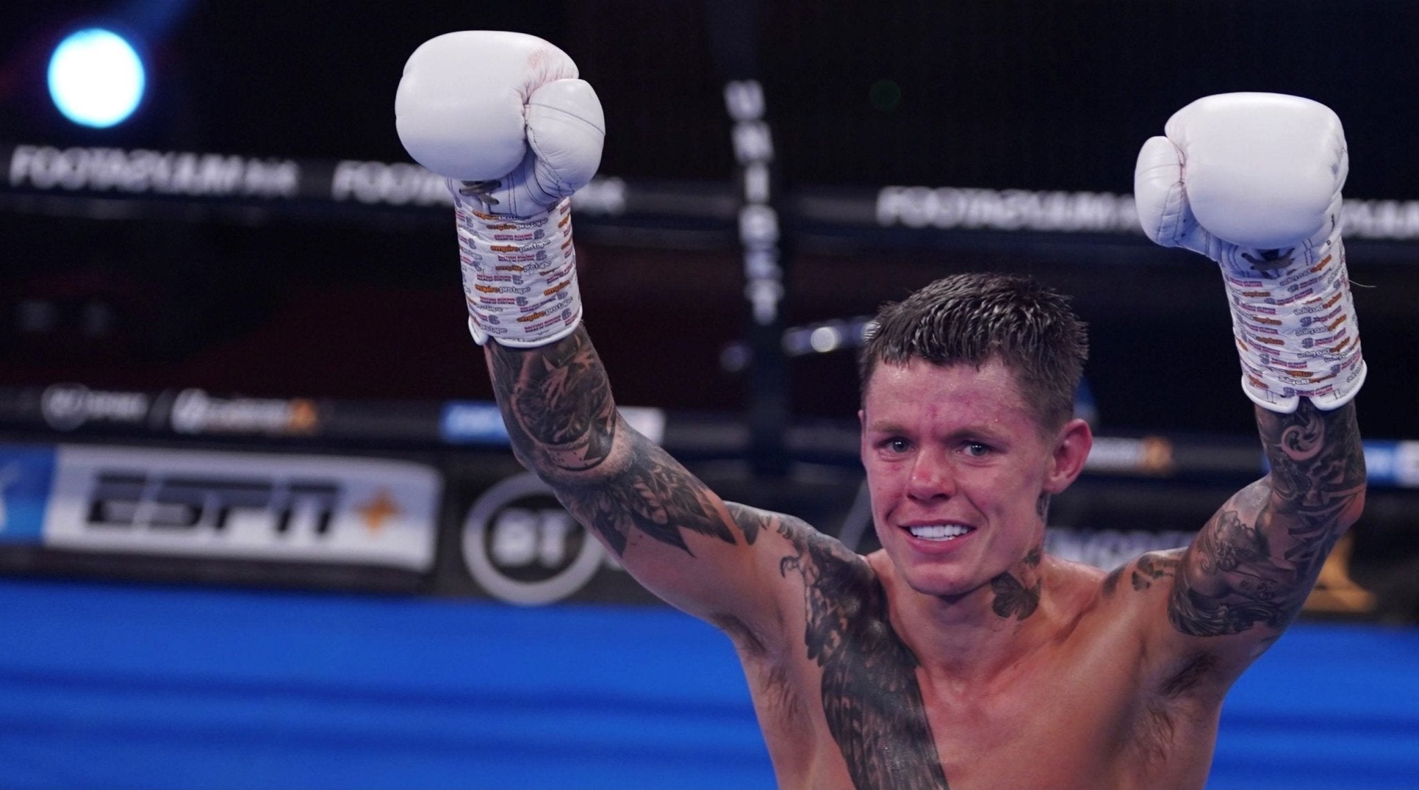 Charlie Edwards celebrating in the ring